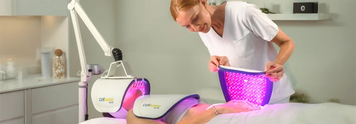 Functional Medicine Toms River NJ Celluma Practitioner A patient laying in a therapeutic bed while a practitioner applied Celluma lights to their body